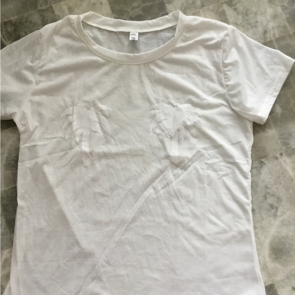 All White Graphic T-Shirt With white 🌴 palm trees 🌴 on the chest.